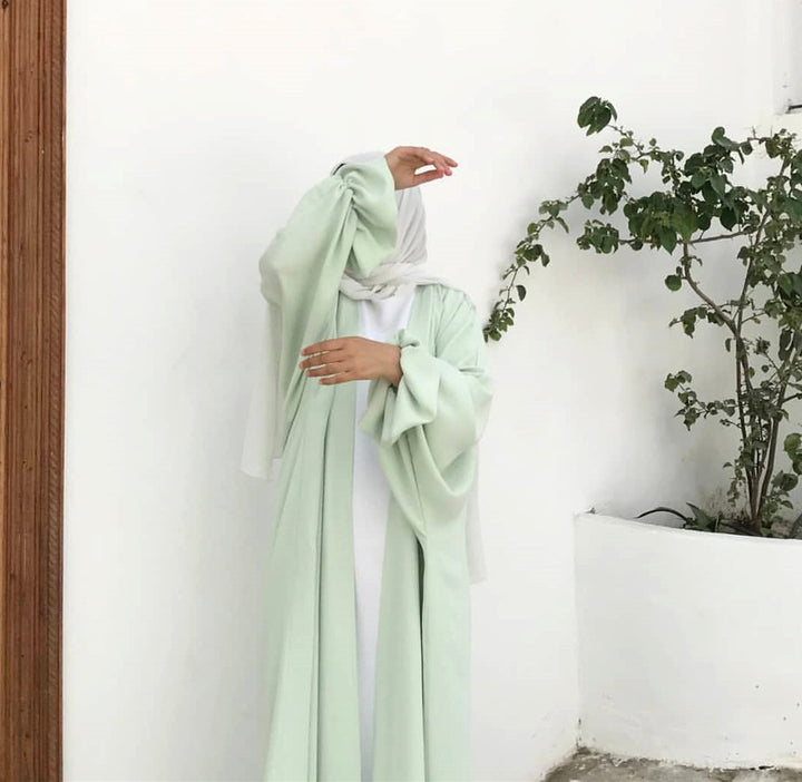 Elegantes Kleid mit Puffärmeln und Dubai-Charme